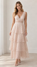 Front view of model wearing Blush Pink sleeveless tiered lace V-neck maxi dress
