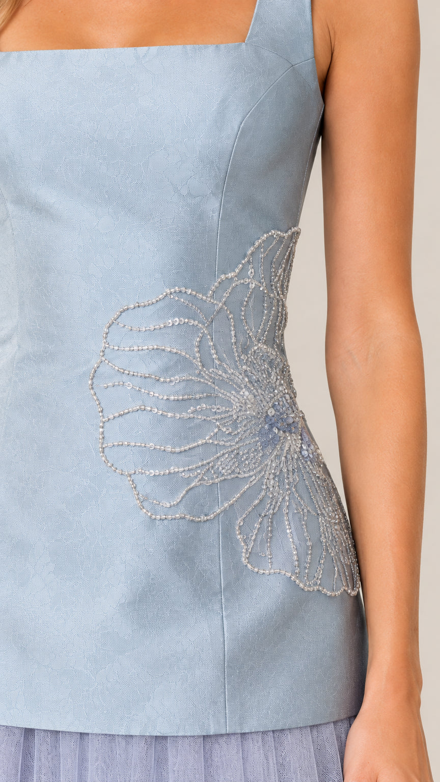 Close up of Light Blue bodice showing square neckline and beaded floral embroidery