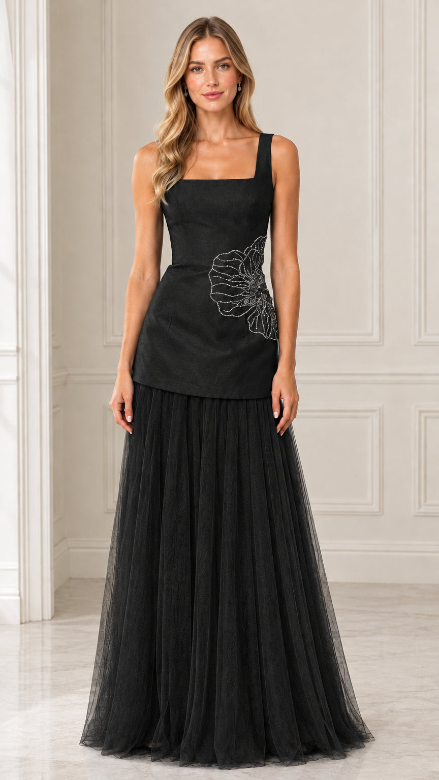 Front view of model wearing Black embroidered drop waist tulle evening gown