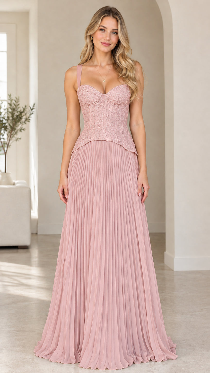 Front view of model wearing dusty pink sweetheart corset pleated maxi dress