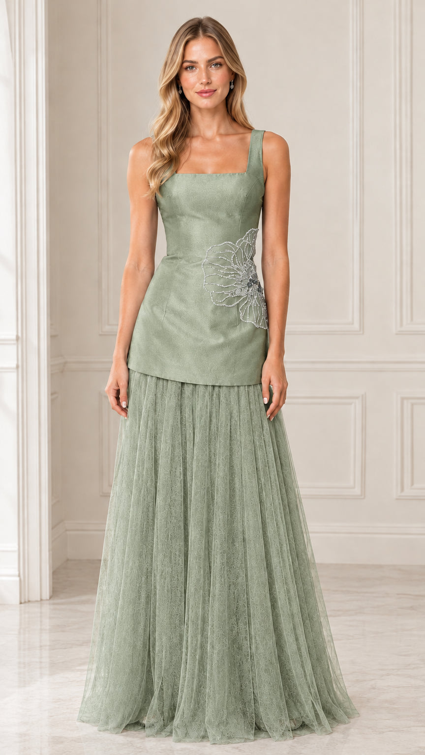Front view of model wearing Sage Green embroidered drop waist tulle evening gown