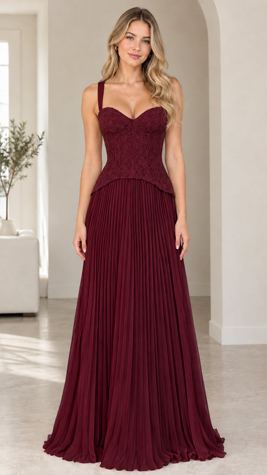 Front view of model wearing burgundy sweetheart corset pleated maxi dress