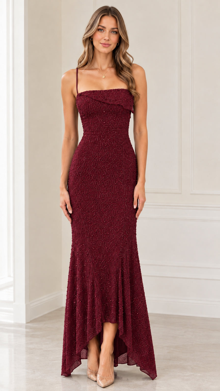 Model wearing burgundy red beaded mermaid formal dress