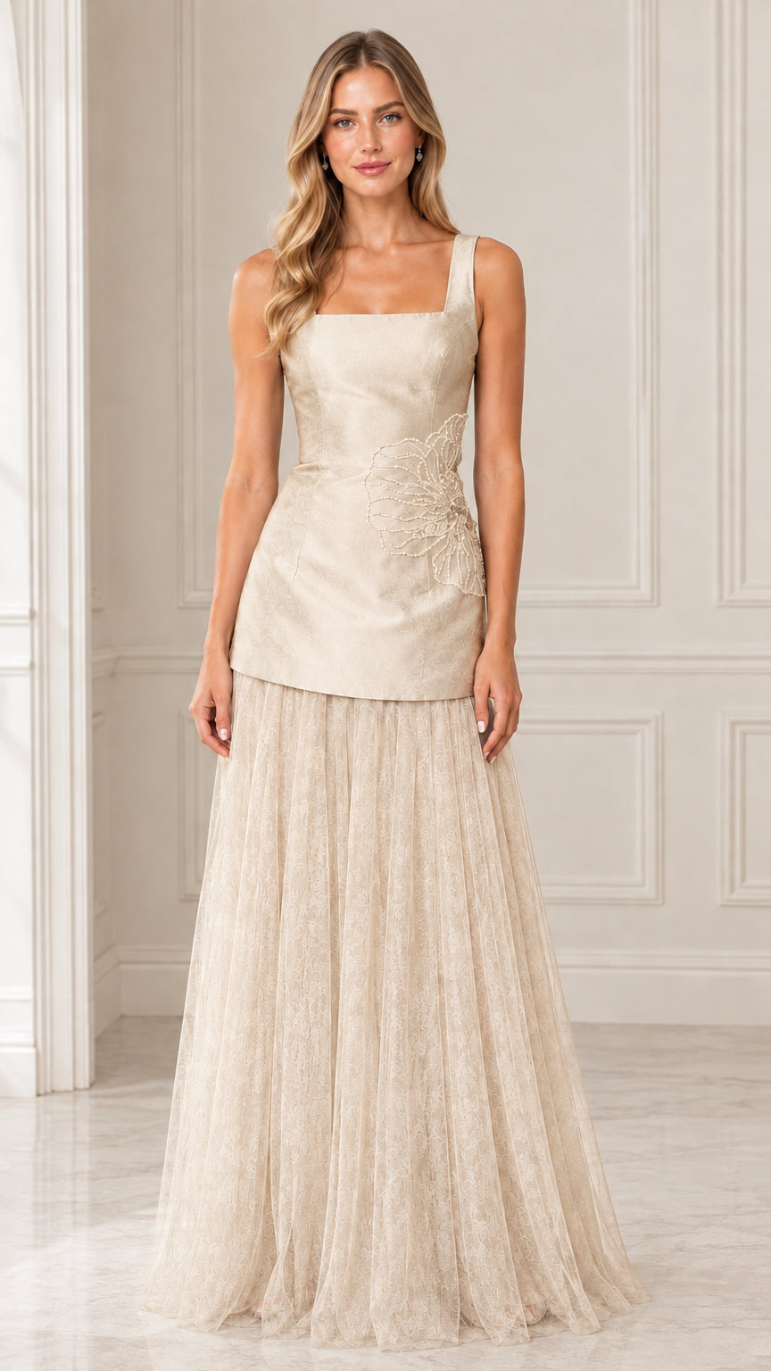 Front view of model wearing Champagne embroidered drop waist tulle evening gown